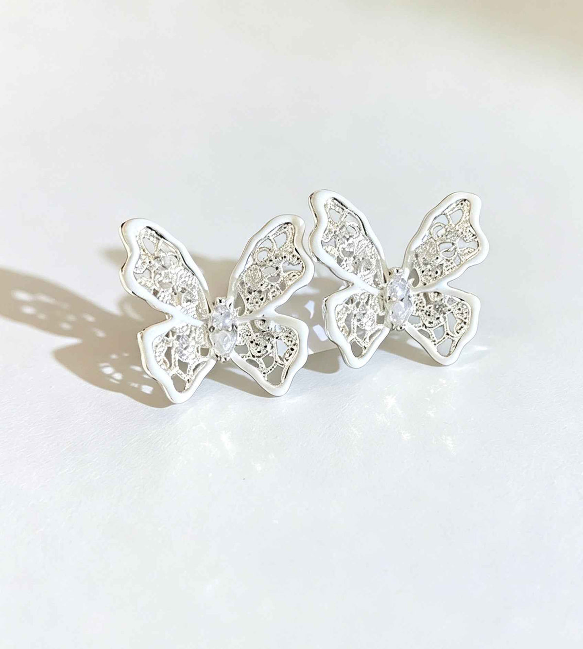 Hollow Butterfly Zircon Earrings | Elegant 925 Sterling Silver Studs for Any Occasion