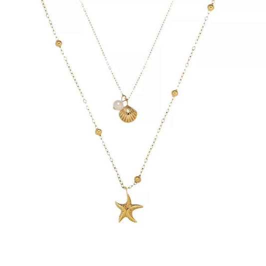 Embrace Coastal Elegance with Our Gold Stacking Necklace Featuring Starfish & Shell Pendants