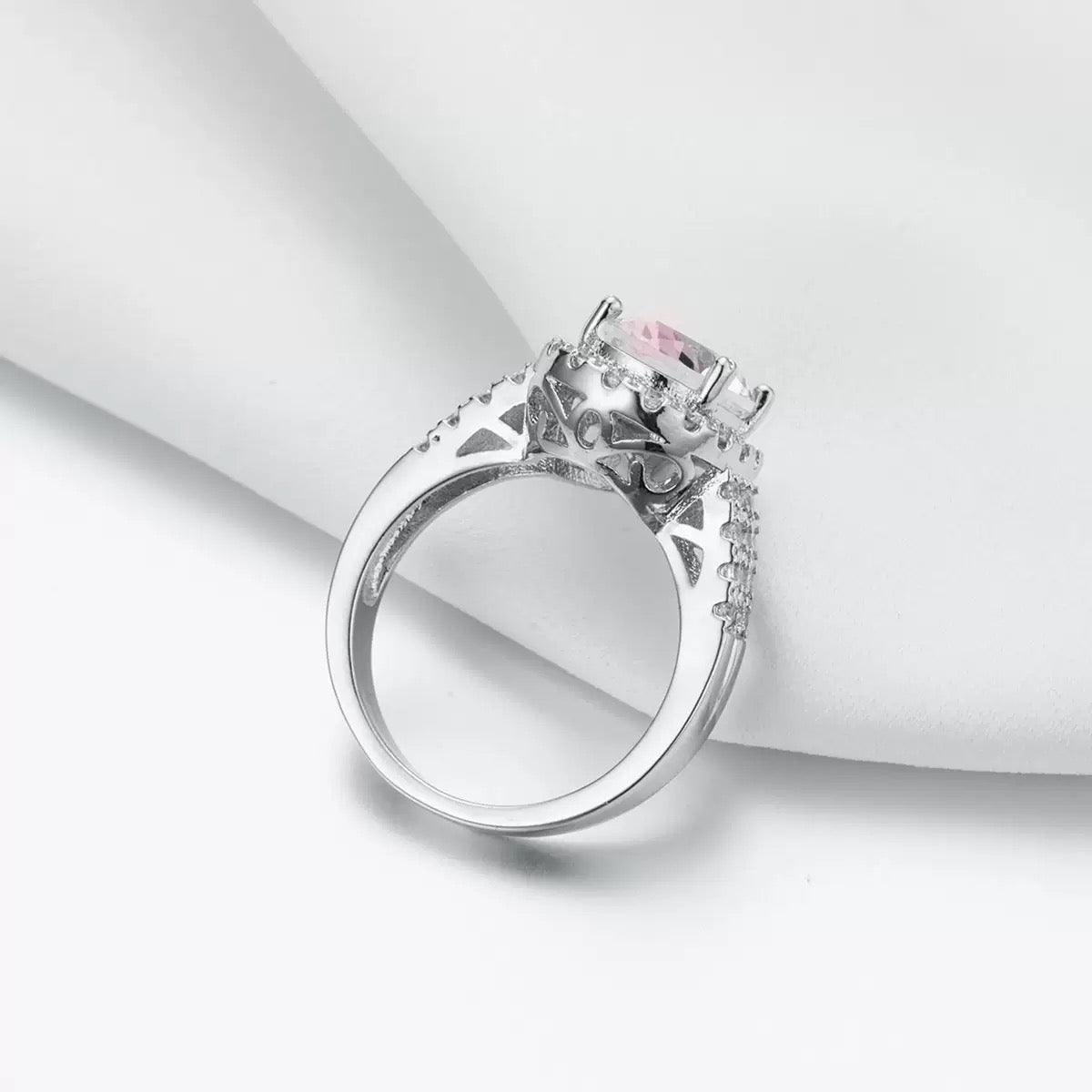 Rose quartz and diamond egg-shaped ring