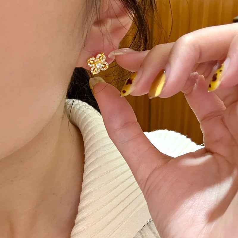 Elevate Your Elegance with Our Gold Floral Stud Earrings