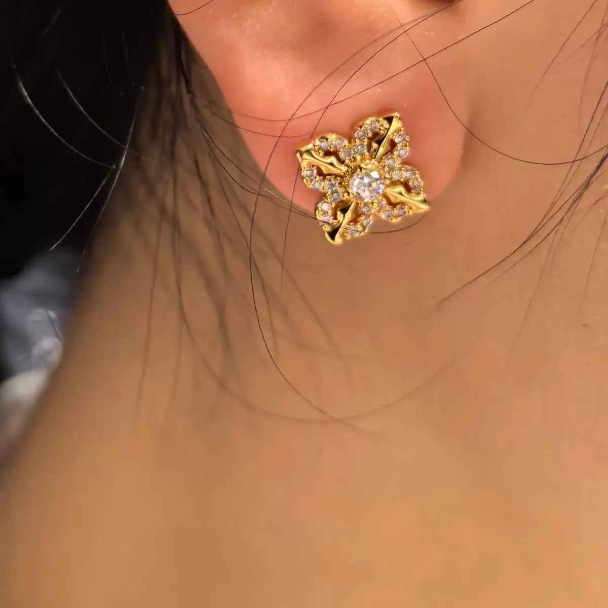 Elevate Your Elegance with Our Gold Floral Stud Earrings