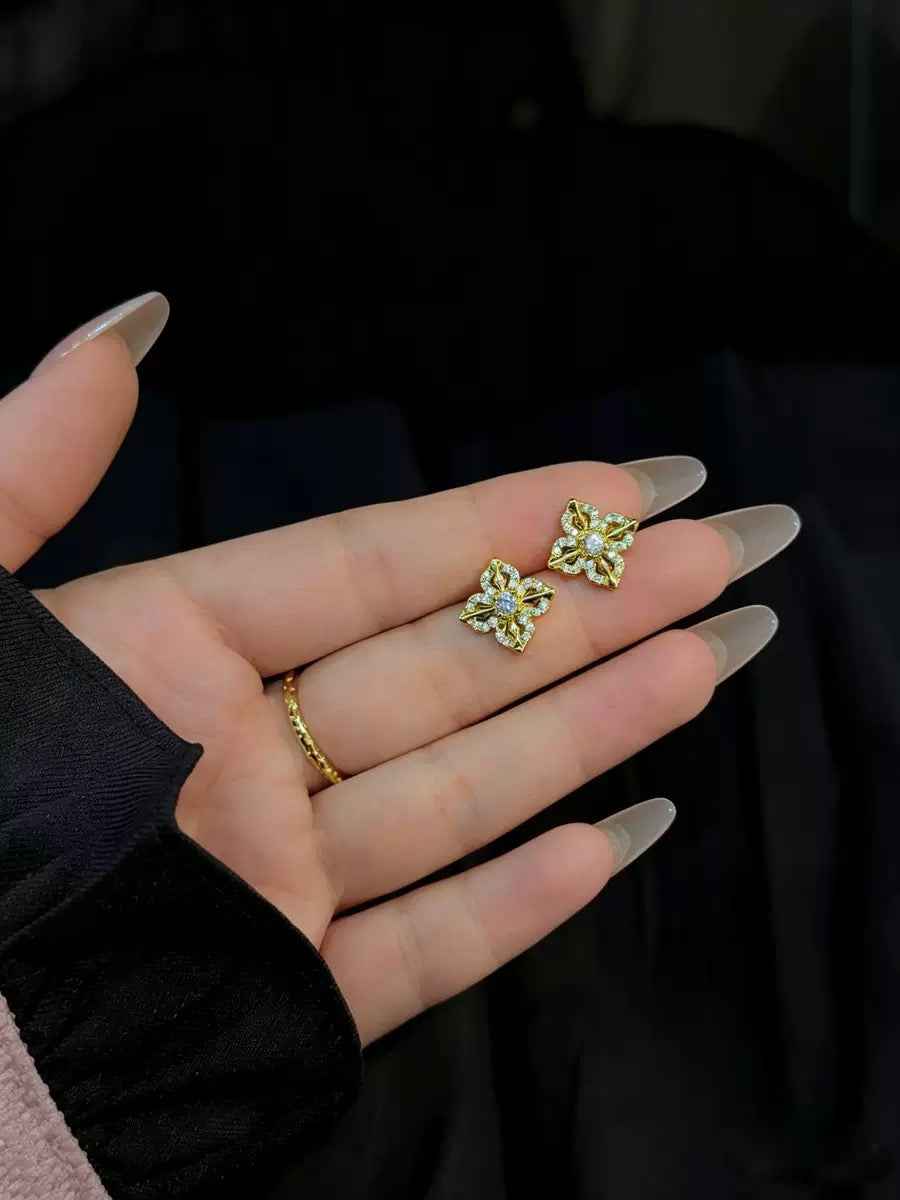 Elevate Your Elegance with Our Gold Floral Stud Earrings
