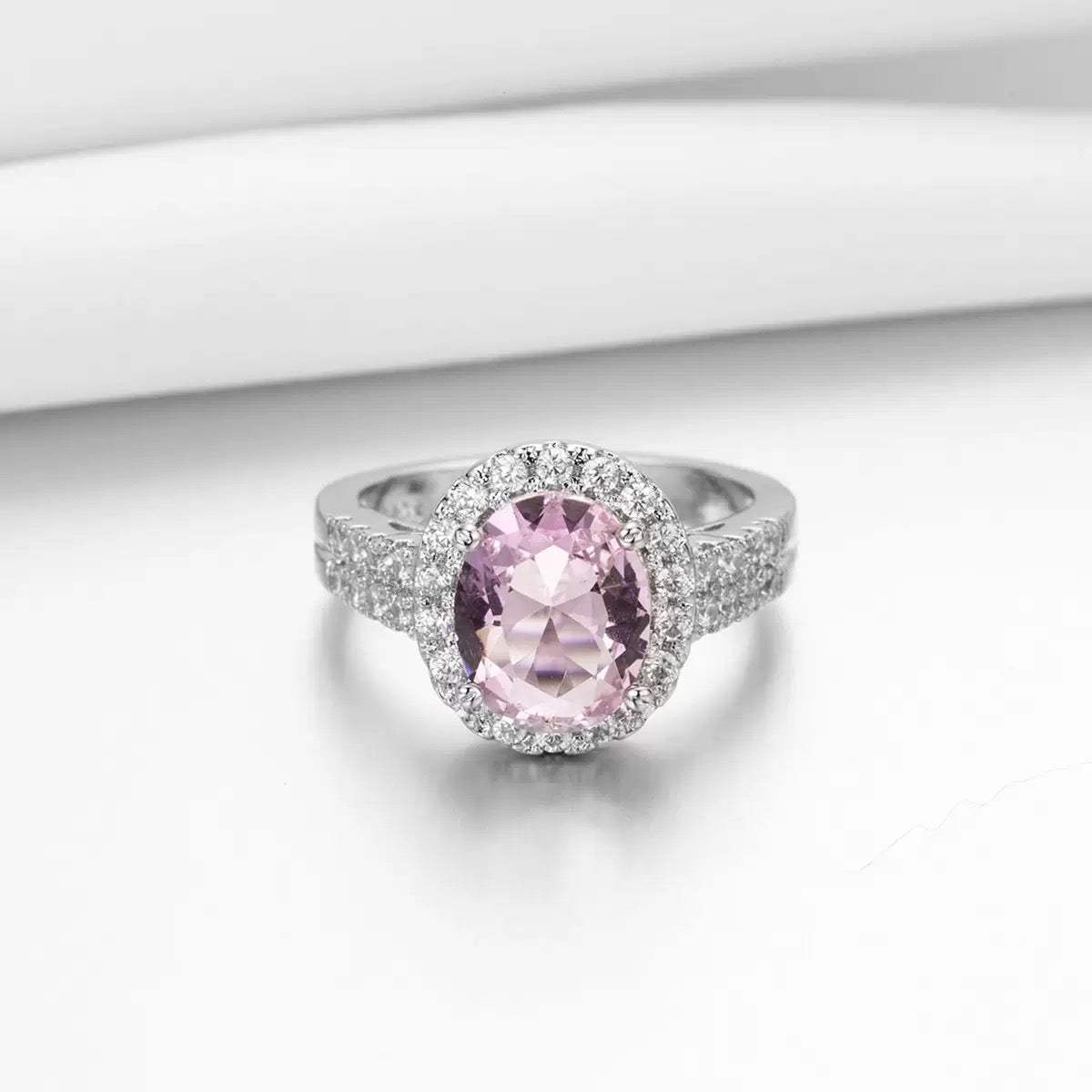 Rose quartz and diamond egg-shaped ring